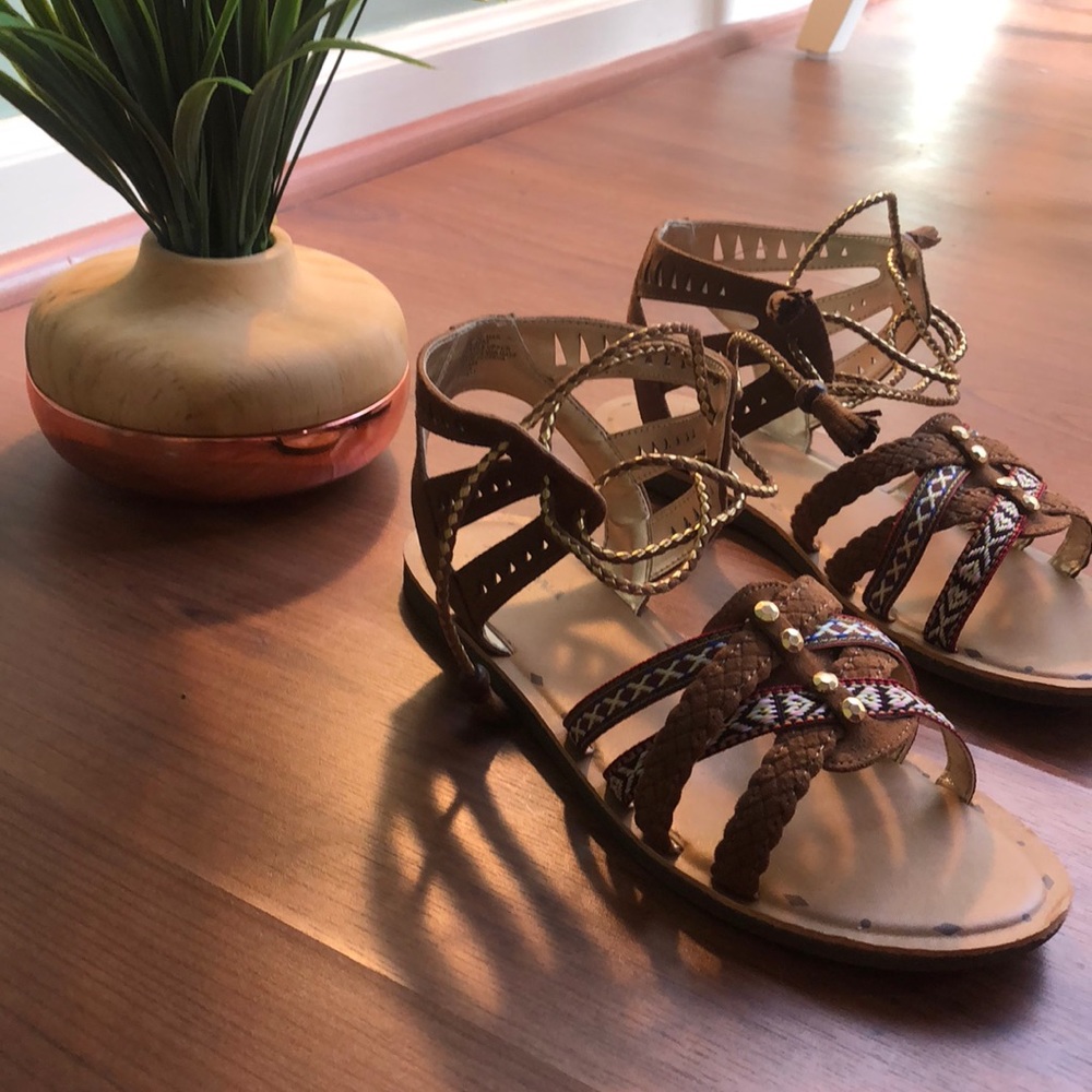 Brown, gold, and tribal colored sandals
